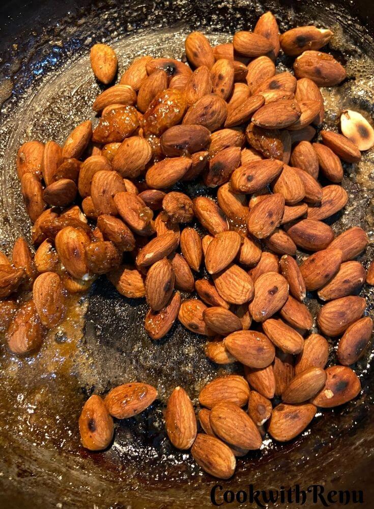 Adding of almonds in the pan