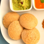 4 Idlis served along with chutney and sambar