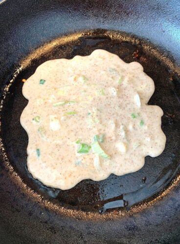 Pancake batter poured on a pan