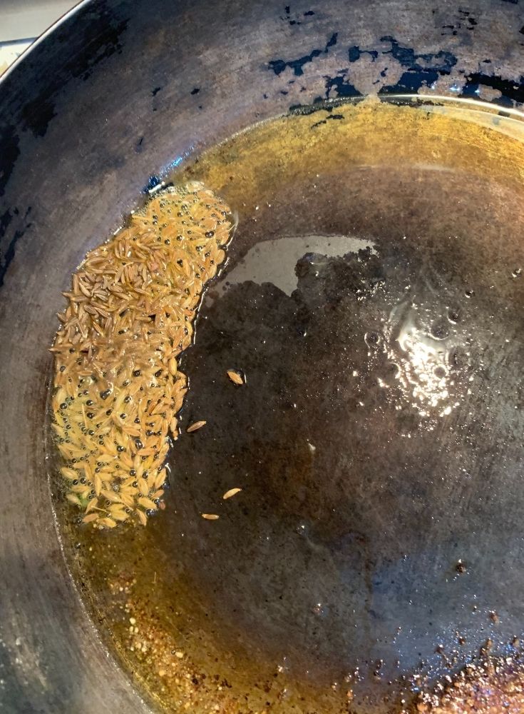 Adding Asafoetida & Cumin Seeds
