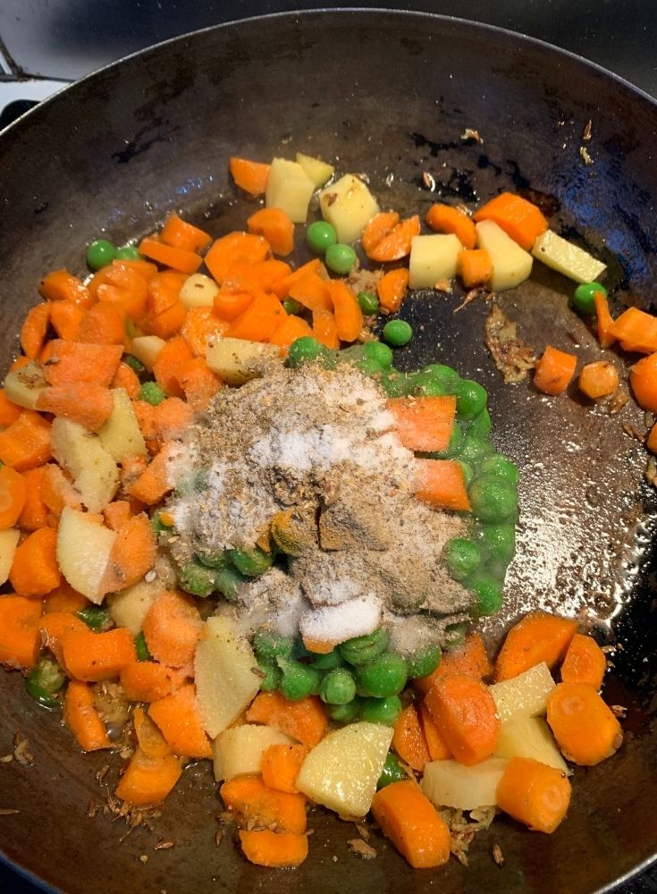 Adding Turmeric Powder, Garam Masala and Salt