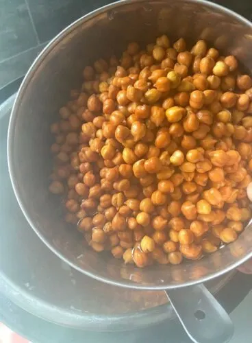 Adding of Chana in the cooked masala