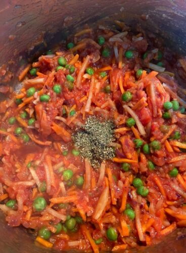 Adding of Mixed herbs and red chili powder