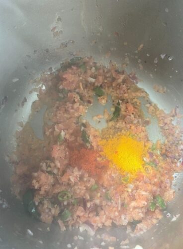 Adding of Red Chilli and Turmeric Powder
