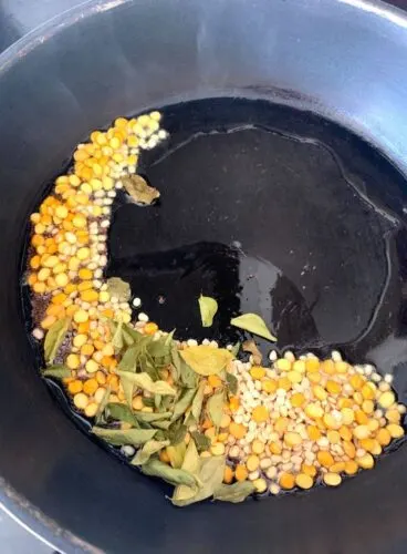 adding of dal, curry leaves