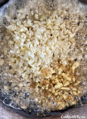 Adding of Ginger and Garlic in pan