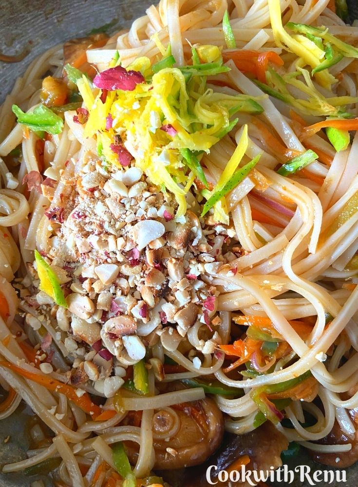 Adding of peanuts and green mango