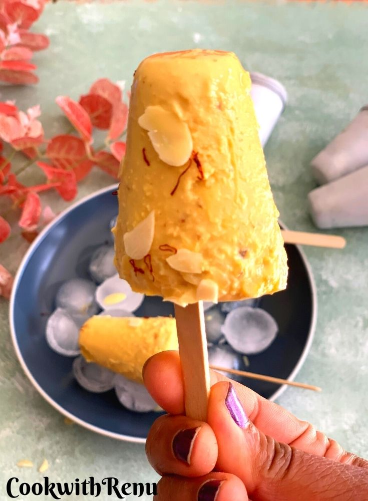 Close up look of Kulfi seen holding in a hand