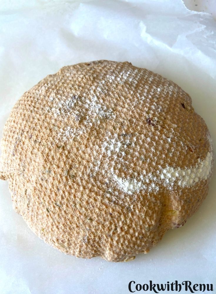 Dough ready to be baked, on a parchment paper
