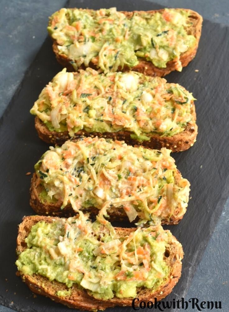 Bread slices spread with the veggie mixture