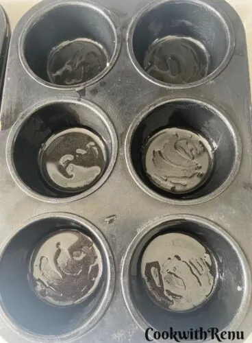Greased Muffin Tins