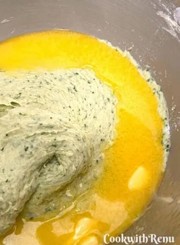 Adding butter to dough