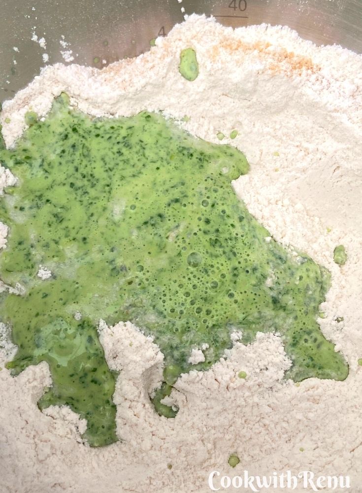 Adding yogurt & nasturtium mixture to dough