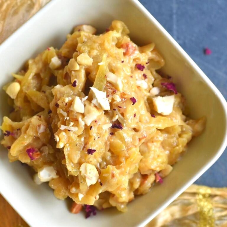 Close up look of Lauki halwa served in a diamond shape cream bowl