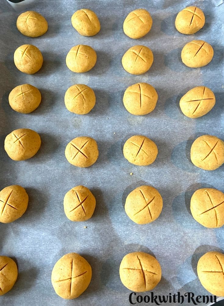 Shaping the nankhatai, giving a cut on the top