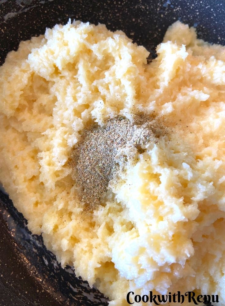 Adding of Cardamom in coconut mixture