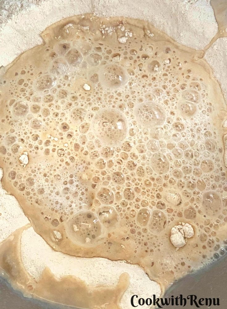 Yeast mixture added to the flour mixture