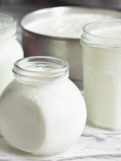 Close up look of yogurt in jars seen