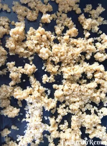 Quinoa arranged on a baking tray
