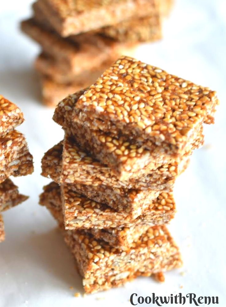 Cut square pieces of sesame seeds brittle stacked one above the other