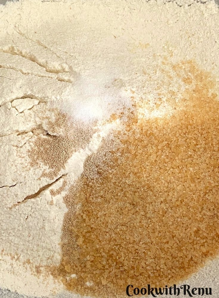 Adding sugar in flour