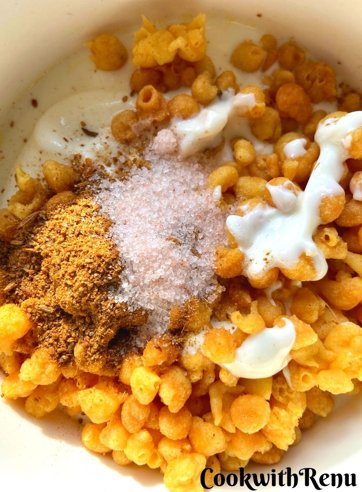 Adding all the ingredients in the yogurt