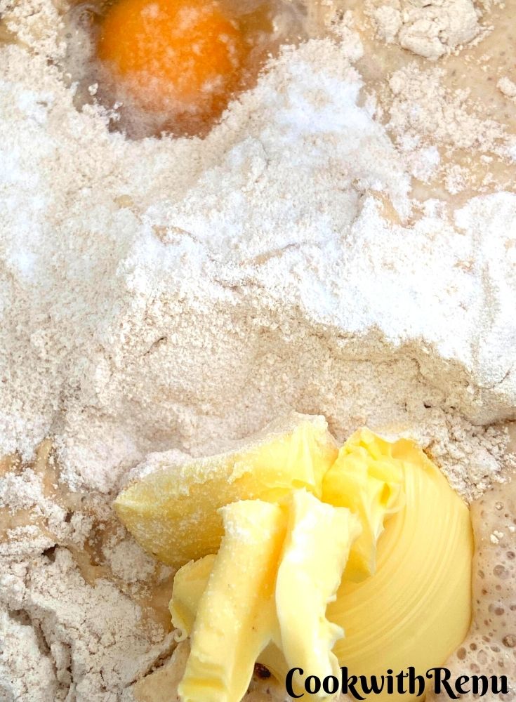 Egg and butter added to flour