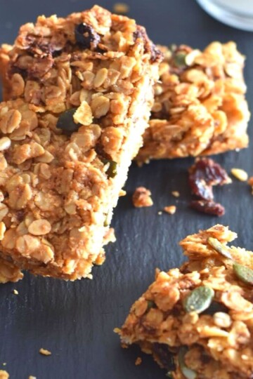 Irish Oat Flapjacks arranged on a black cheese board