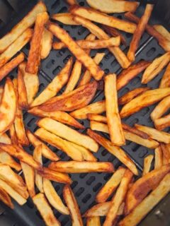 French fries in an air fryer basket