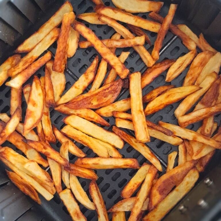 French fries in an air fryer basket