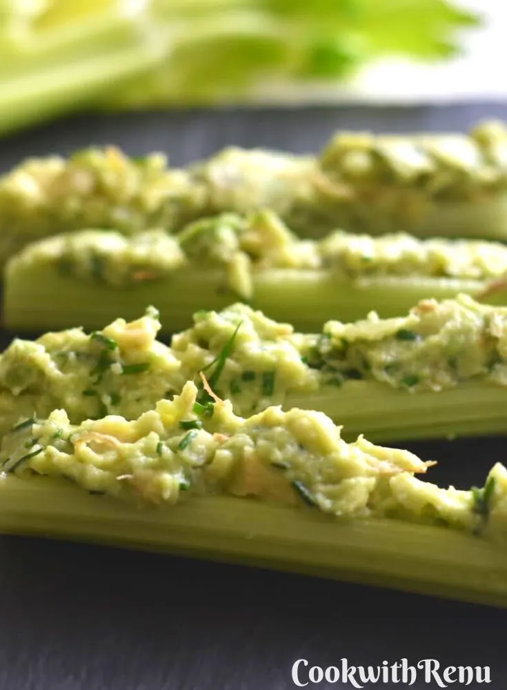 Close up look of Celery Sticks stuffed with avocado mixture