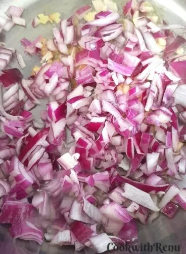 Onion, ginger and garlic getting saute