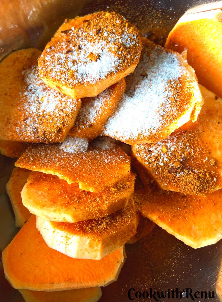 Salt, olive oil and peri-peri spice mix added