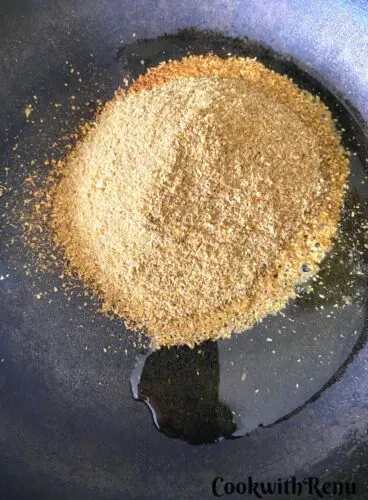 Adding of Coriander powder to pan