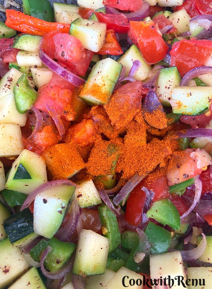 Adding of Paprika to veggies