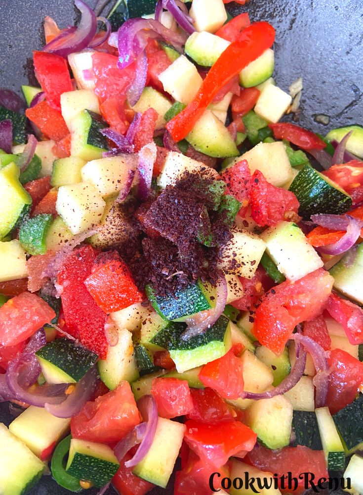 Adding of Zaatar Spice