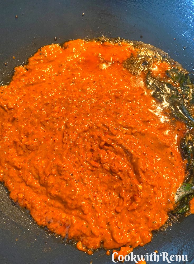 Chutney pasted being added to tempering