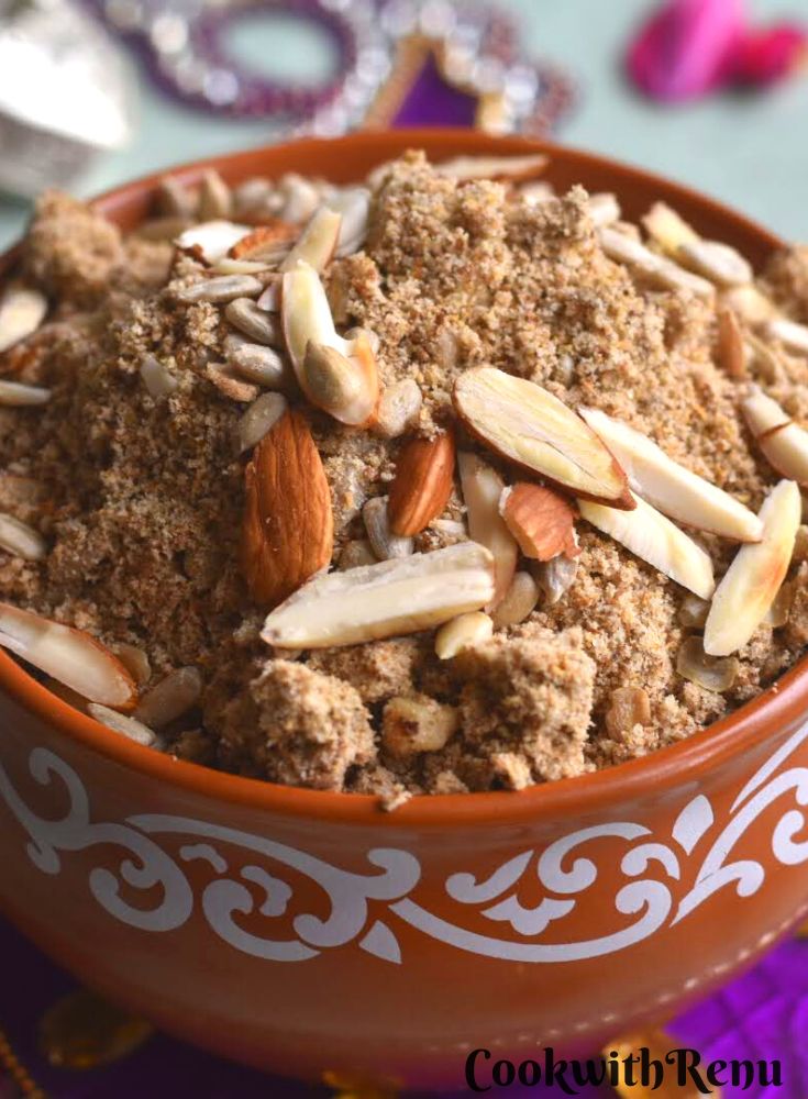 Close up look of Buckwheat flour and coriander prasad , kuttu dhaniya Panjiri bhog served in a brown bowl.