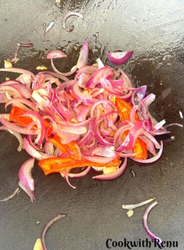 Onion, chilies, garlic and ginger getting sautéed