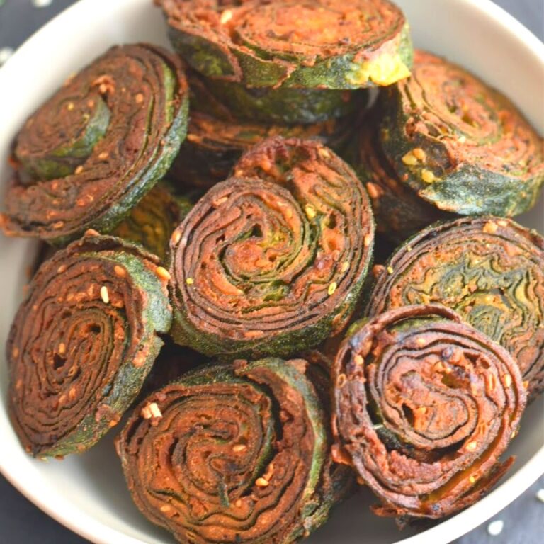 Butternut Squash leaves patra served in a cream bowl