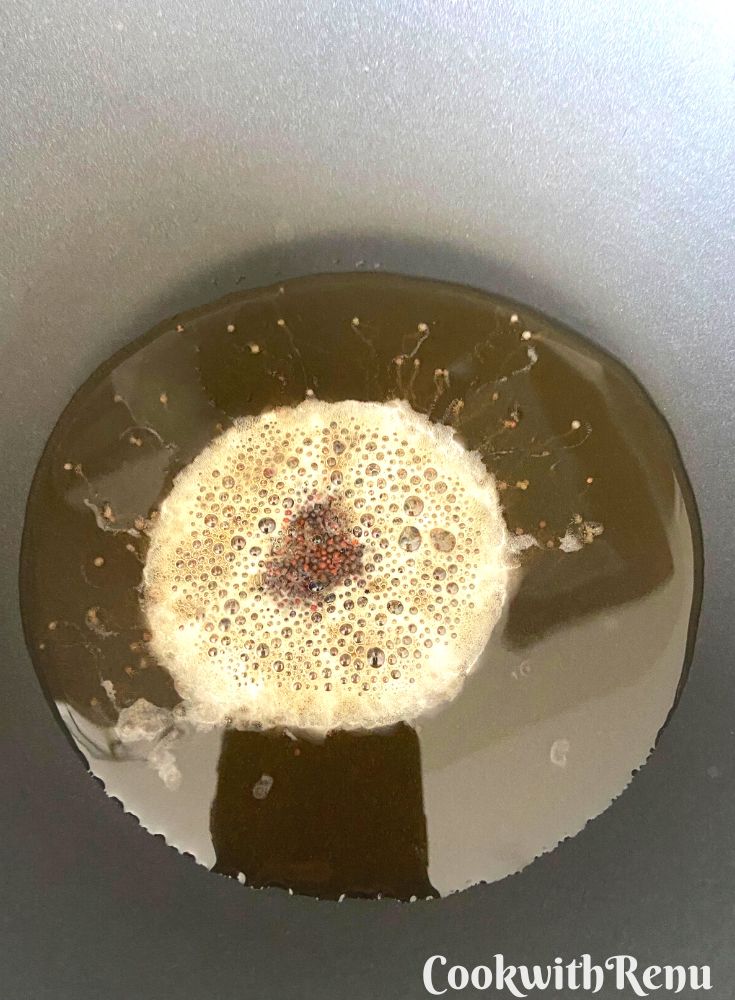 Tempering of mustard seeds