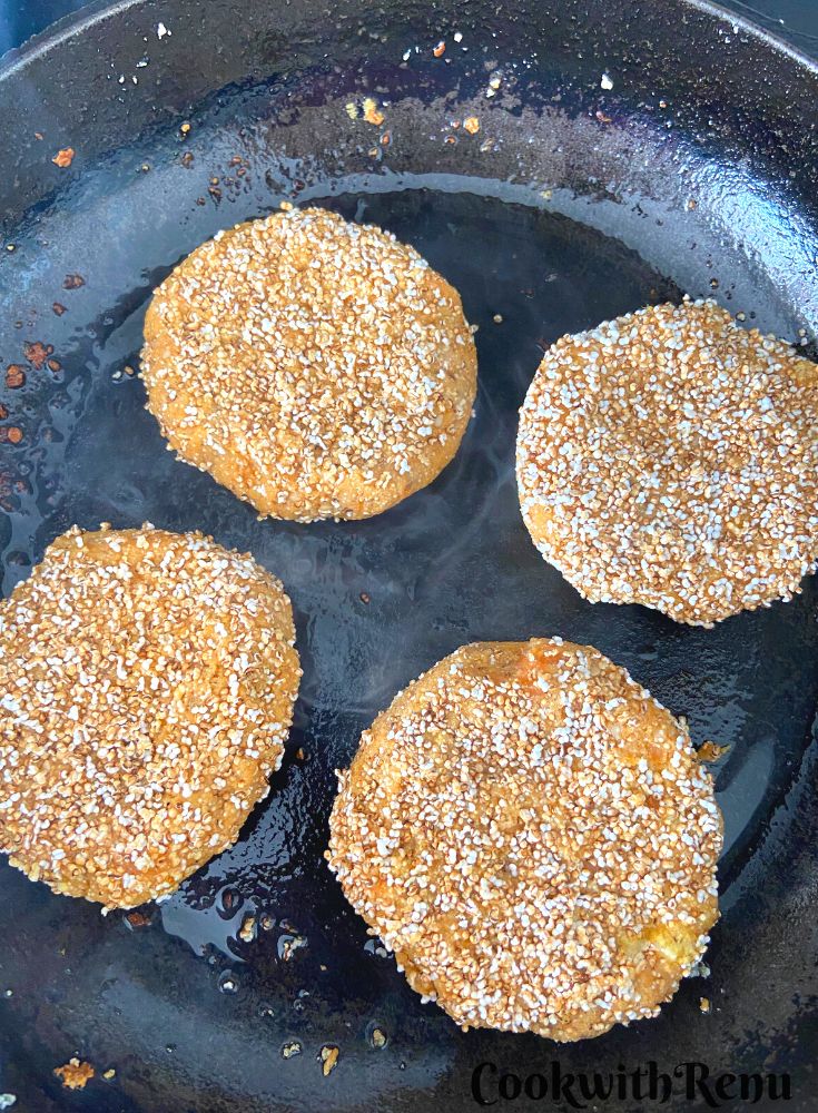 Amaranth Patties getting shallow fried.