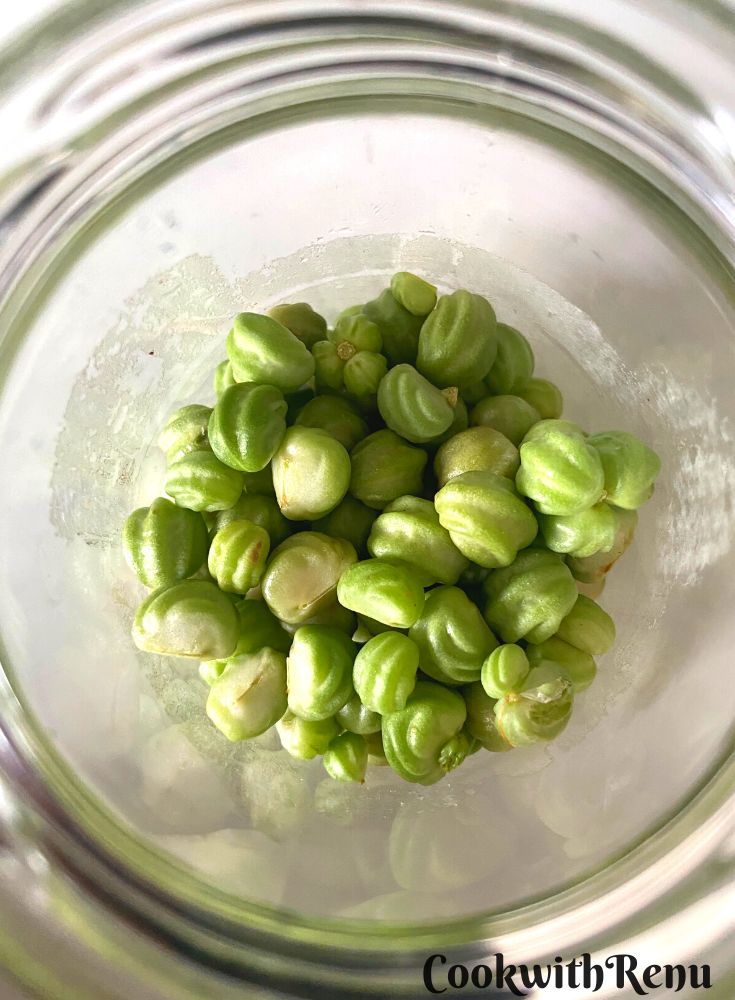 Nasturtium seeds in a mason jar ready to pickle.