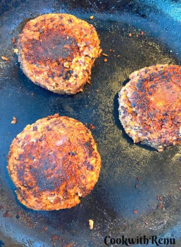 Shallow frying of the patties.