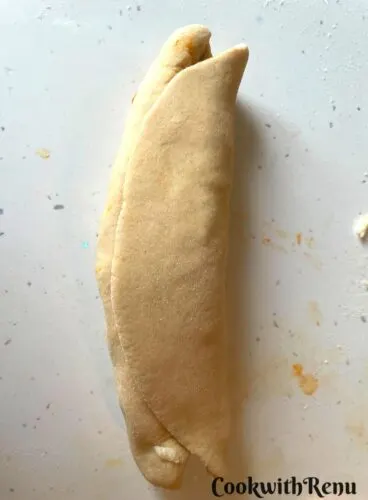 Rolling and sealing of the spooky snake bread.
