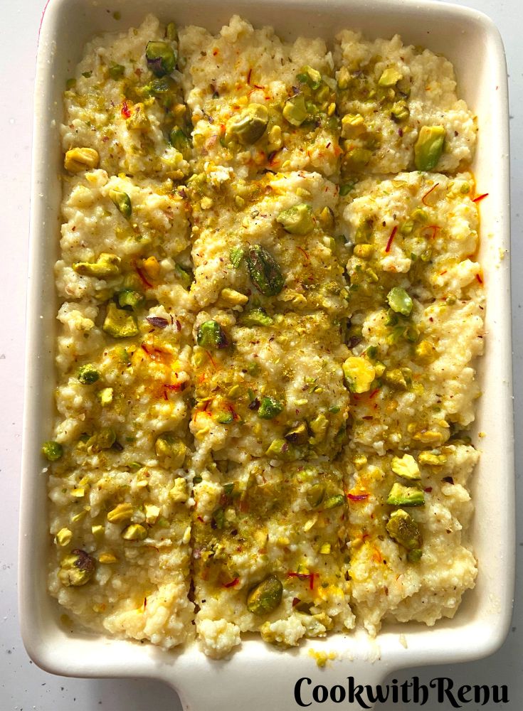 Shaping the Kalakand by giving cuts.