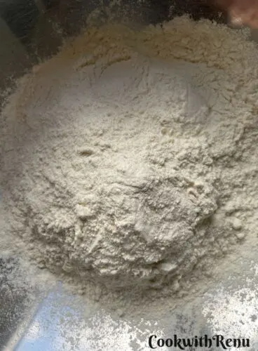 Sifted flour and salt in a bowl.