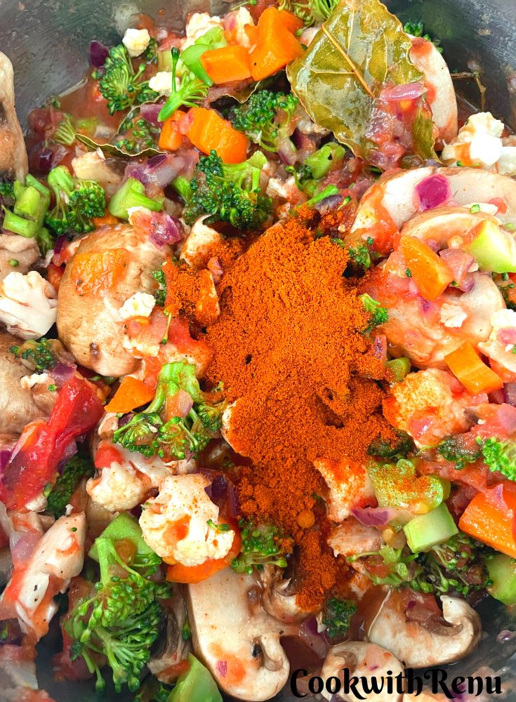 Adding of pepper for Vegetarian Shepherds Pie.