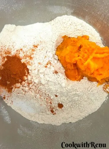 Ingredients for the pumpkin bread dough in a bowl.