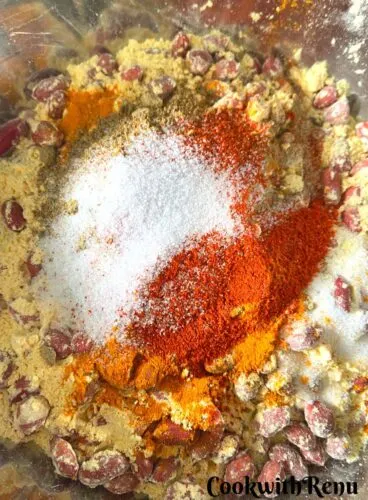 Masala added to peanuts and flour.